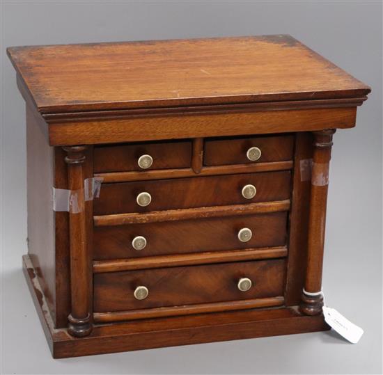 A Victorian mahogany miniature chest of five drawers H.30cm